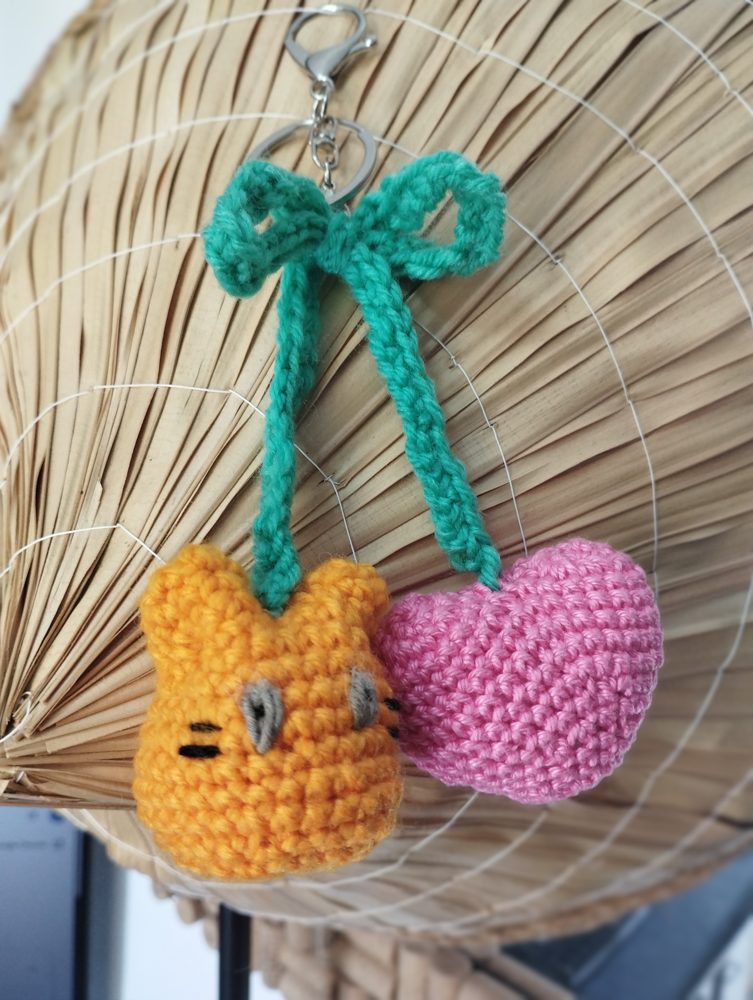 Crocheted cat and heart charm keychain