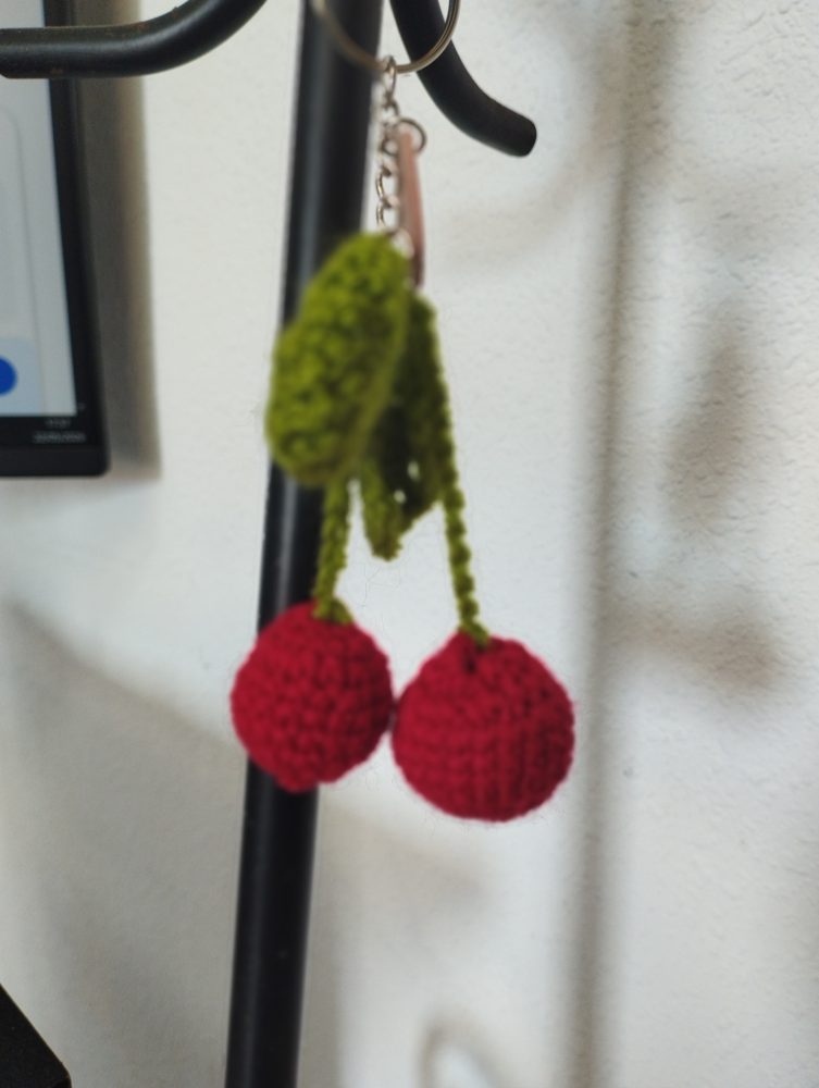 Crocheted cherries keychain
